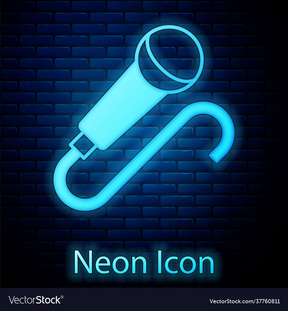 Glowing neon microphone icon isolated on brick Vector Image