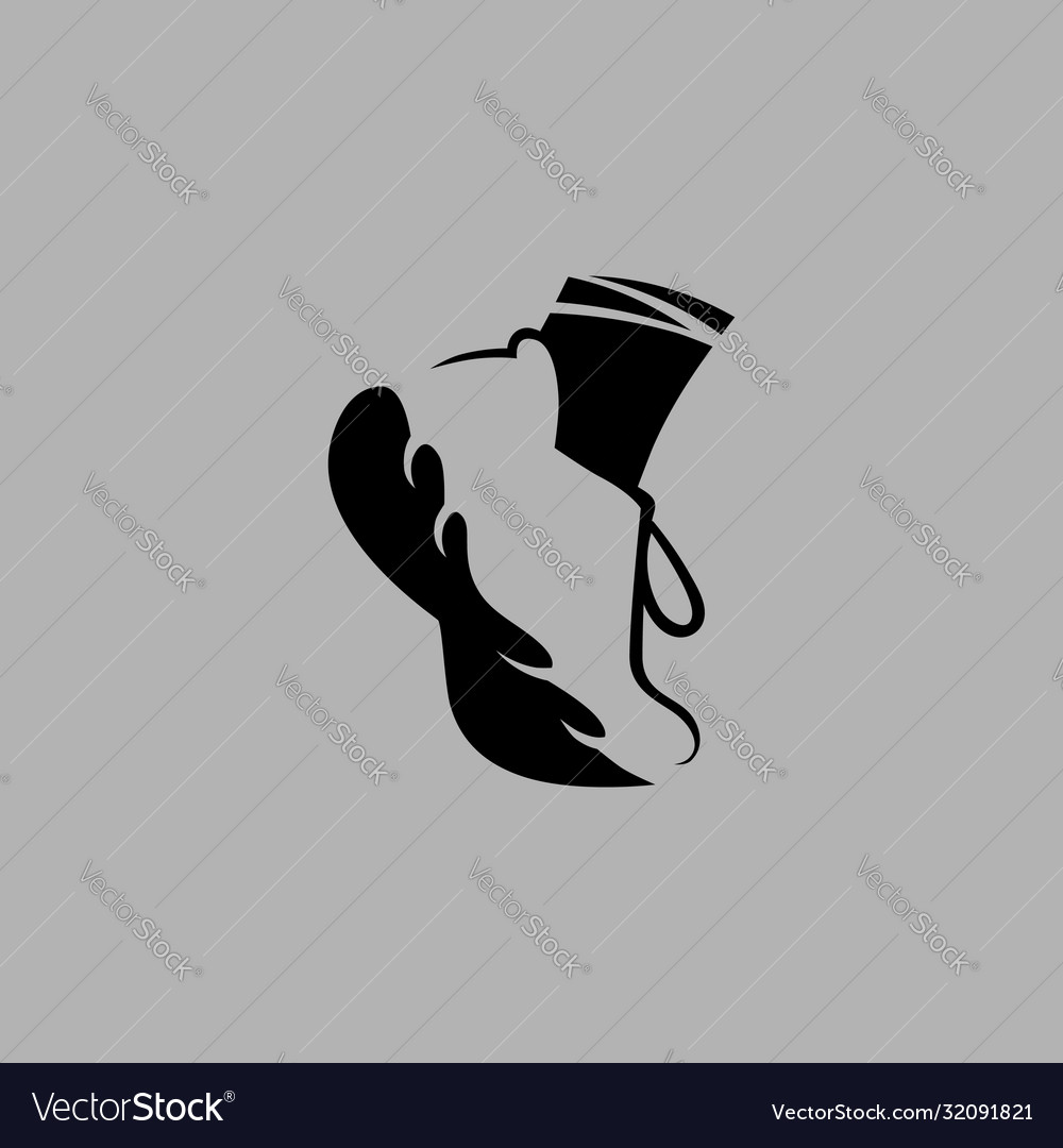 Running shoe symbol on gray backdrop Royalty Free Vector