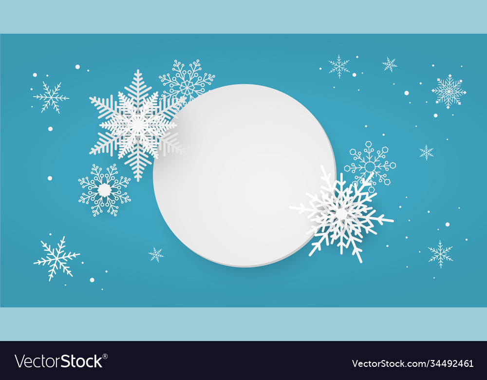 Paper white circle with snowflakes on blue