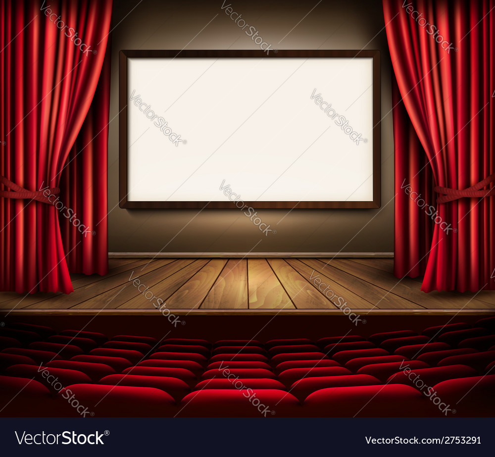 A theater stage with red curtain seats