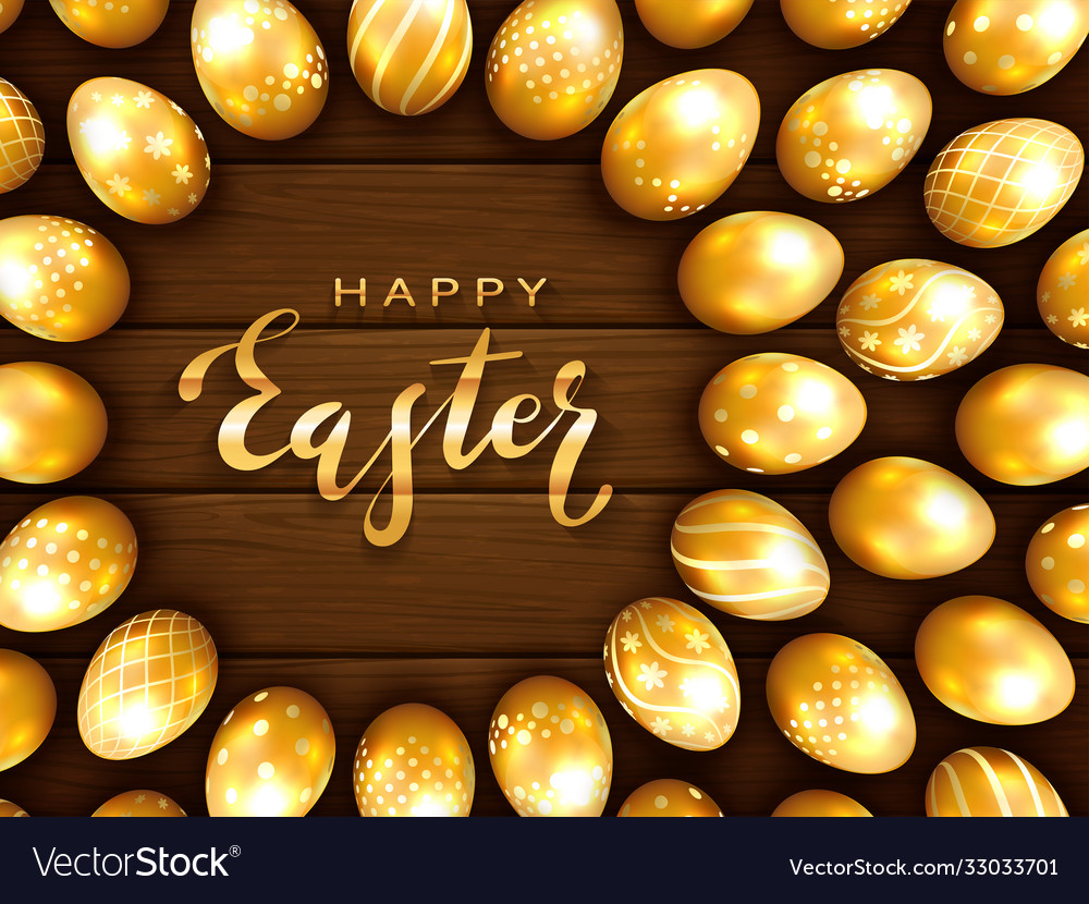 Golden easter eggs on wooden background