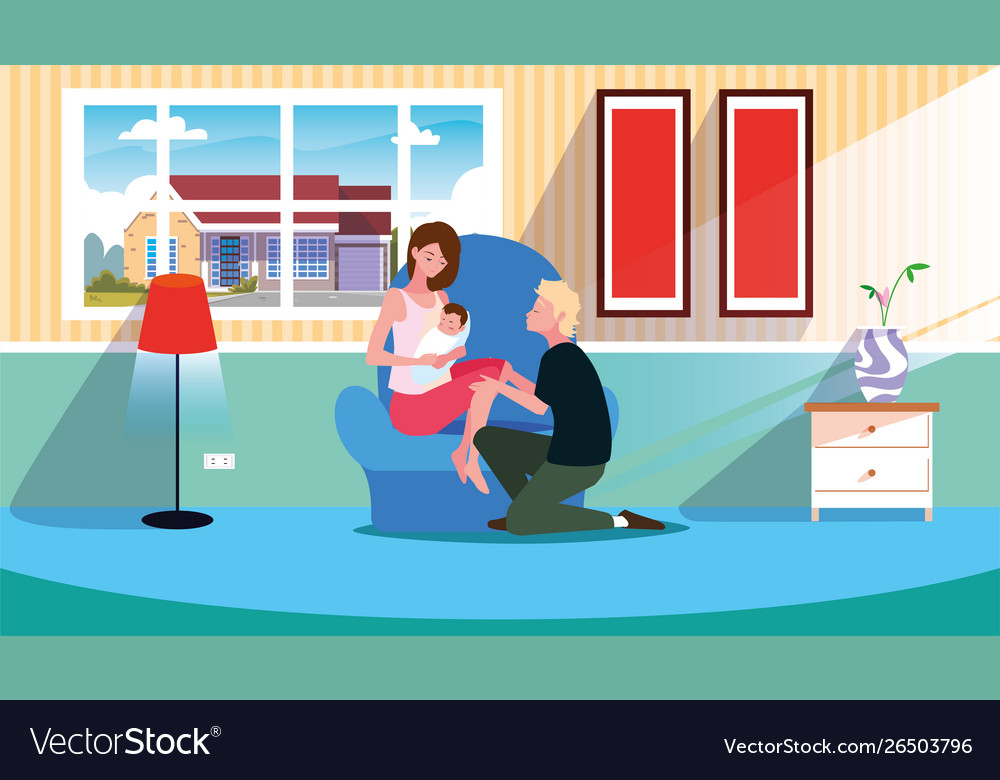 Couple with baby in sofa - pregnancy