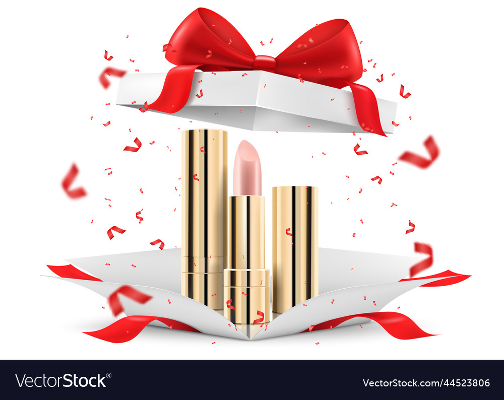 Colored lipsticks lip glosses inside open gift