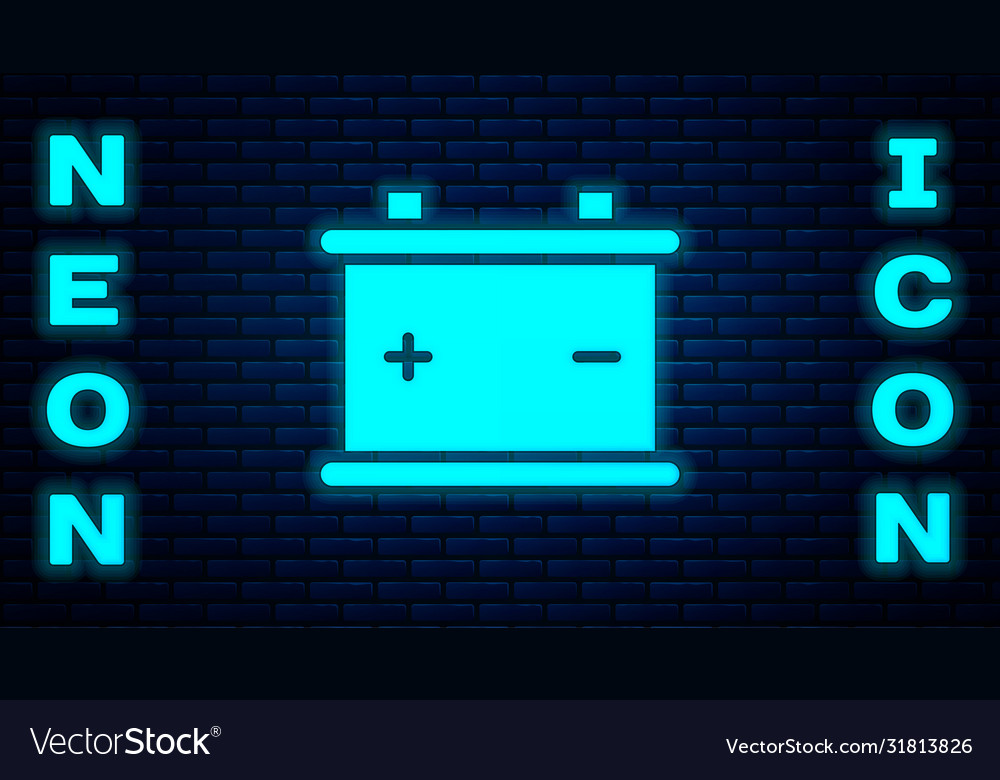 Glowing neon car battery icon isolated on brick