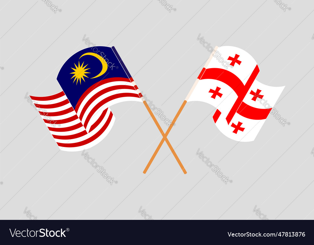Crossed and waving flags of malaysia and Vector Image
