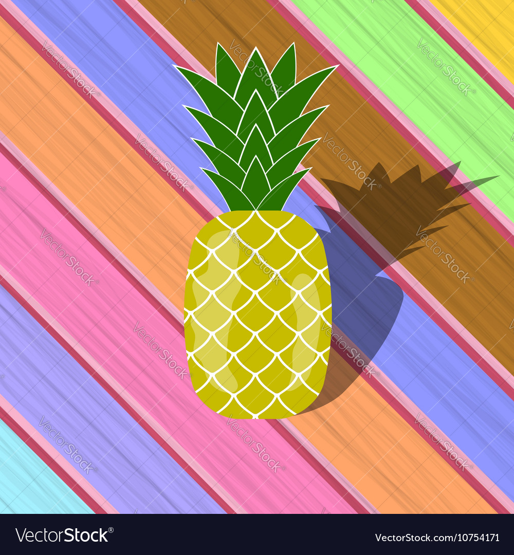 Fresh ripe pineapple on colorful planks