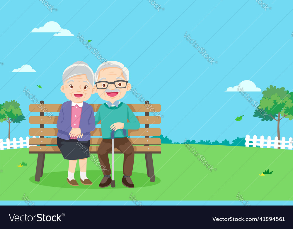 Grandparents are sitting on a bench in the park