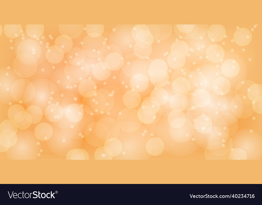 Abstract yellow bokeh background with defocused