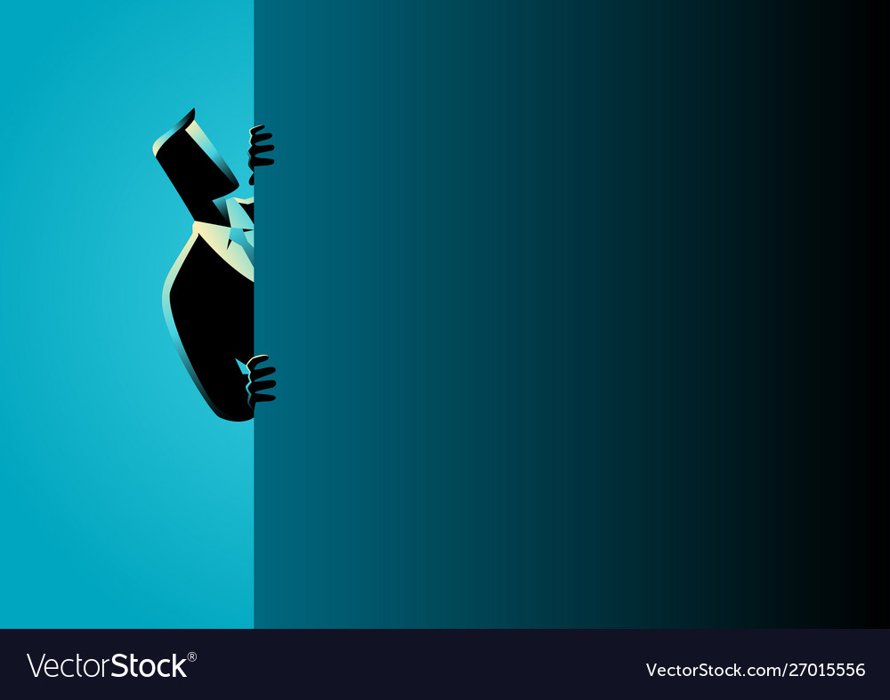 Businessman peeking from behind wall