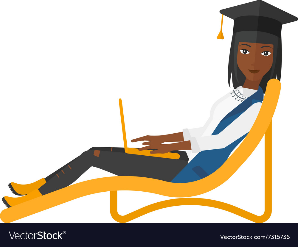 Graduate lying in chaise lounge with laptop