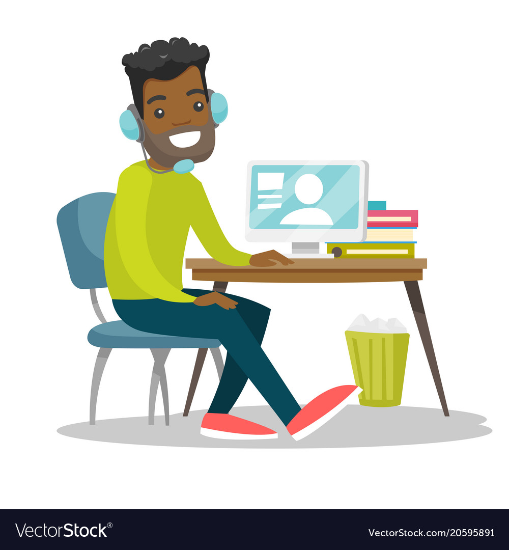 Man using headset and computer in call center