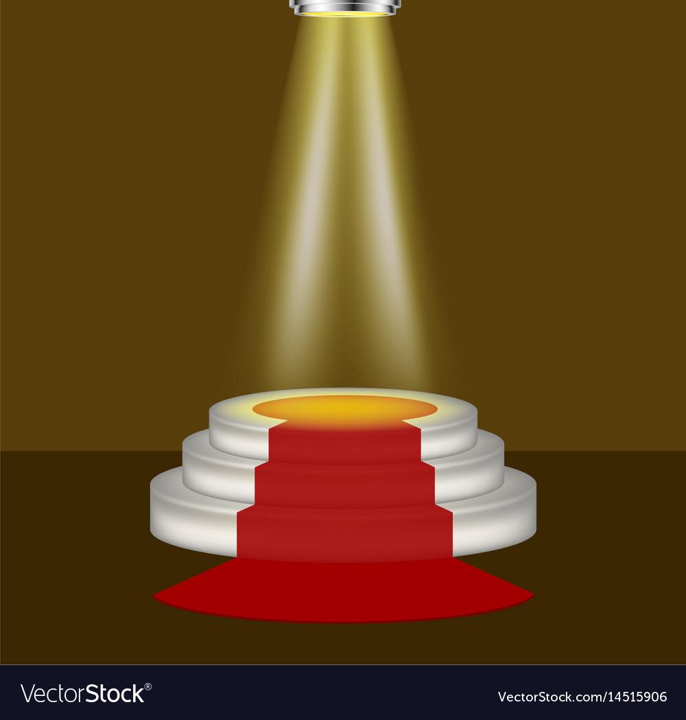Light shines on the empty podium with red carpet