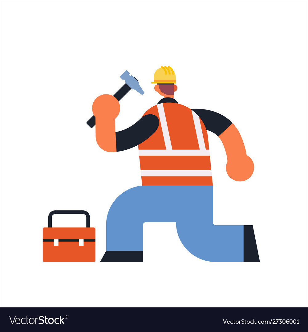 Male builder using hammer and toolbox busy workman