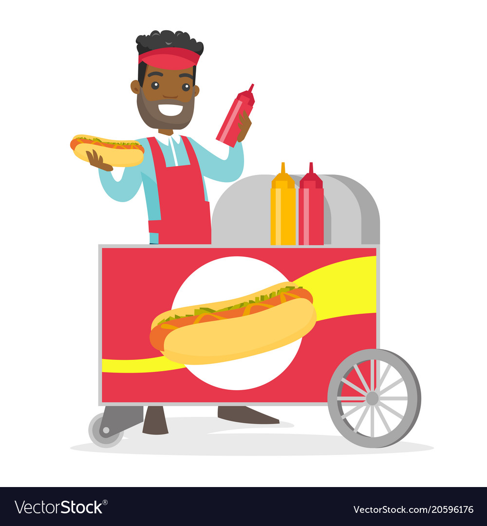 African-american street seller making a hot dog