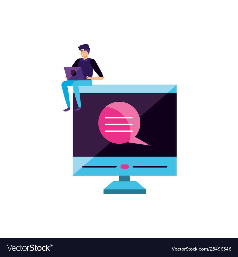 Young man using laptop computer with desktop