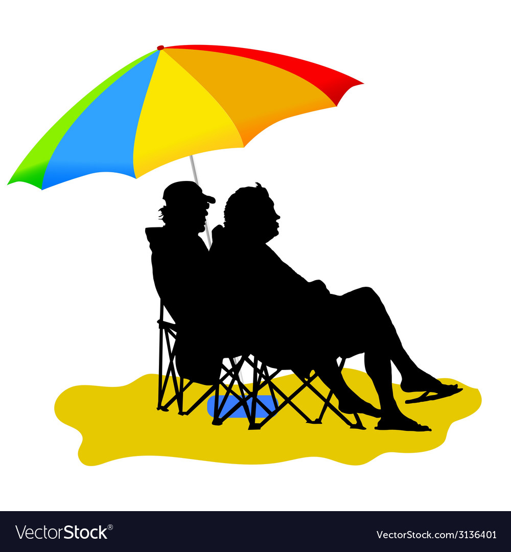 Couple sitting under umbrella