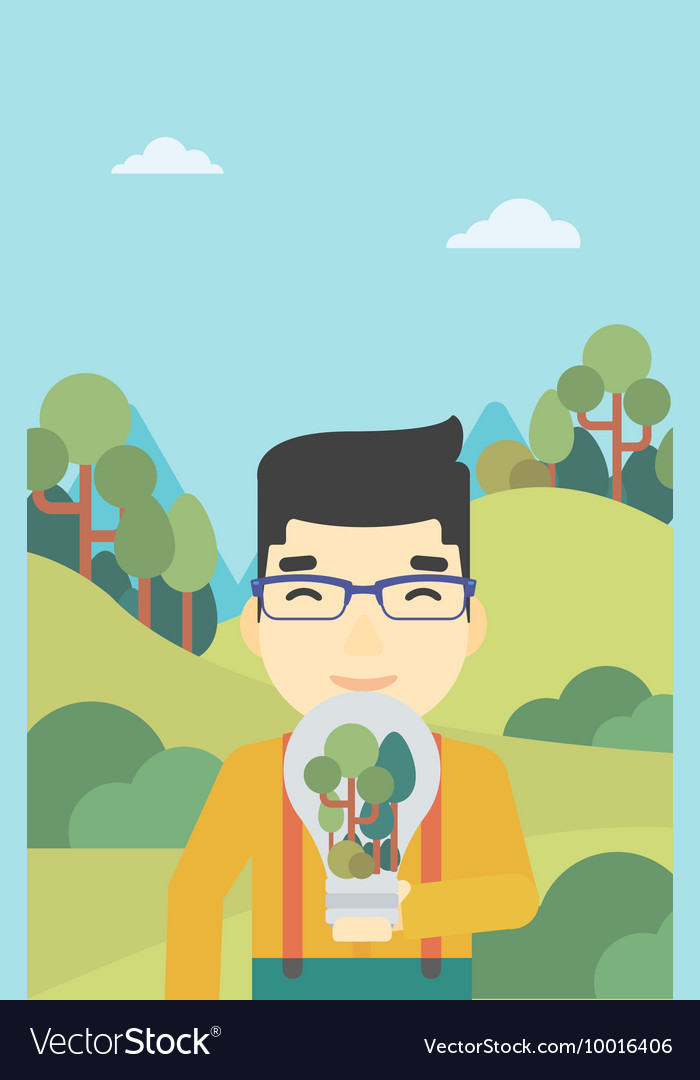 Man with lightbulb and trees inside