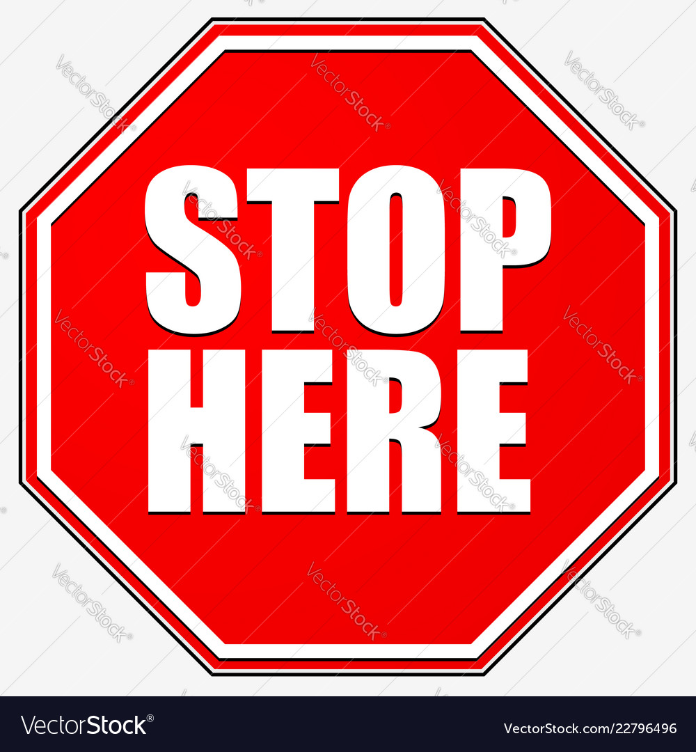 Red Stop Sign with 'STOP HERE' Text