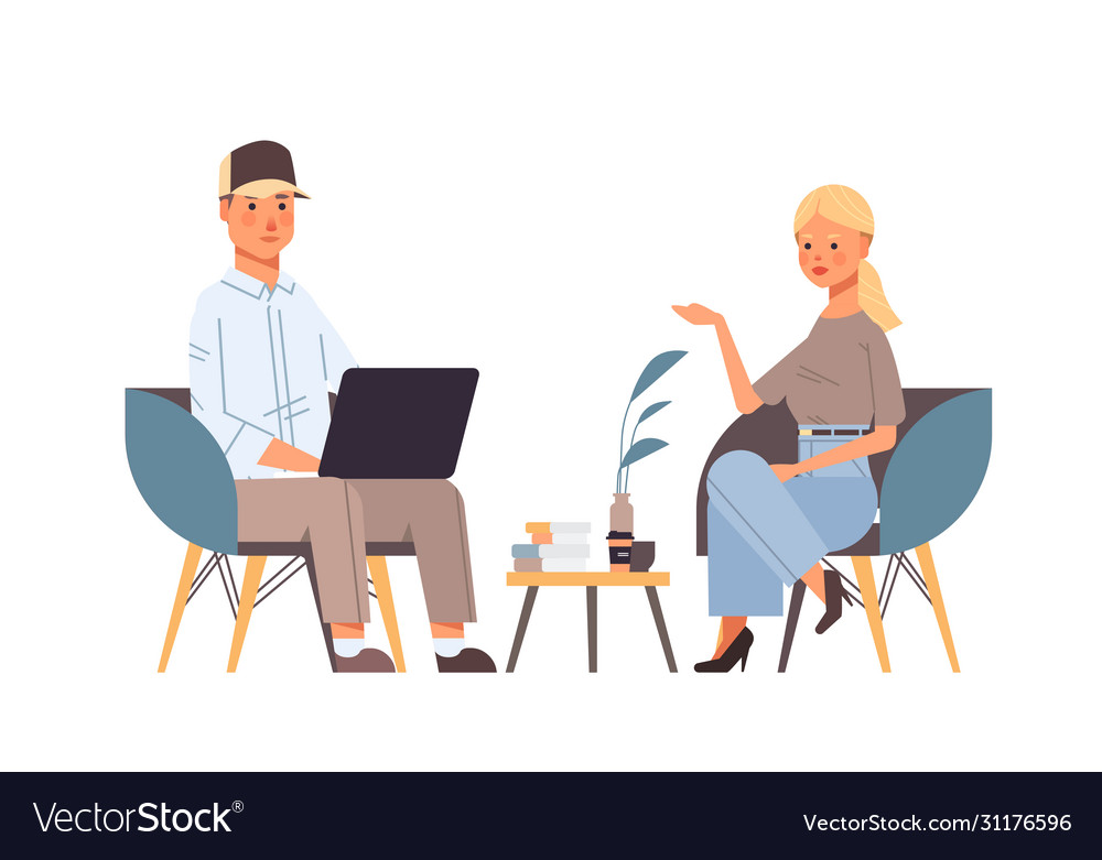 Couple discussing during meeting man using laptop