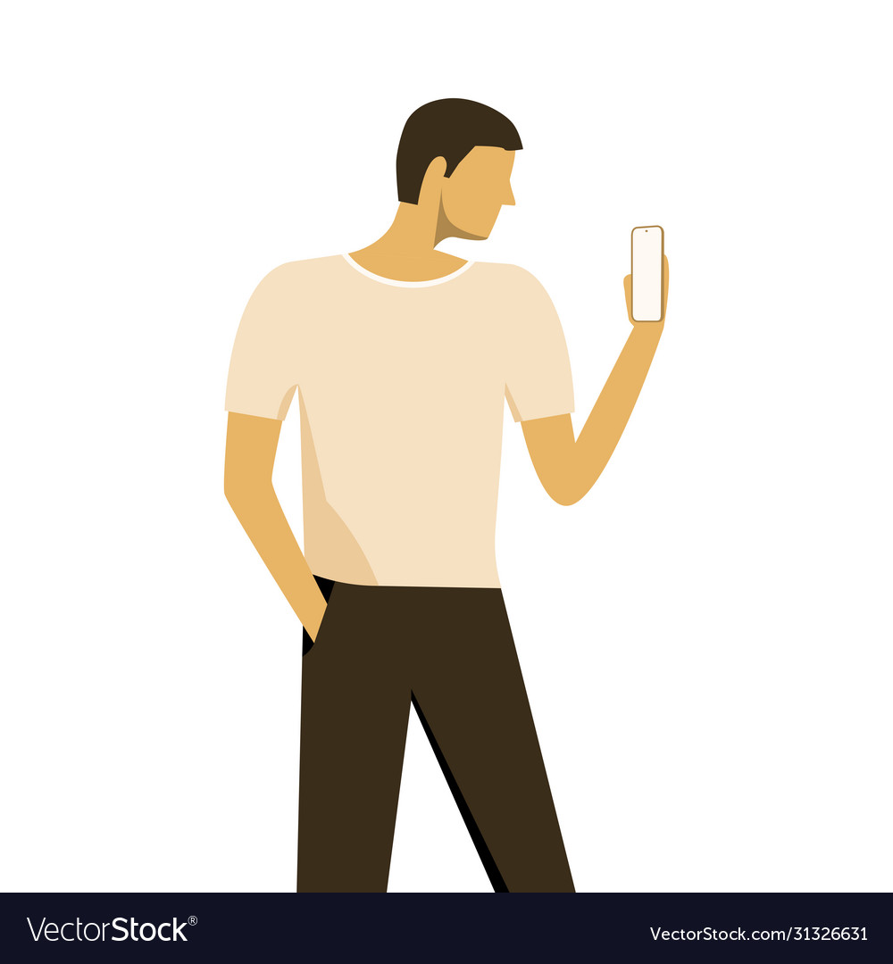 Handsome man standing and holding smartphone