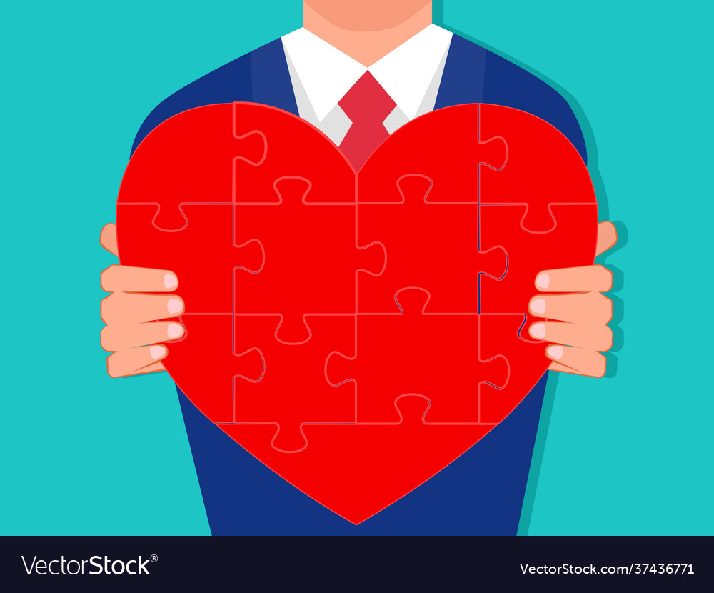 Businessman gives heart isolated on background