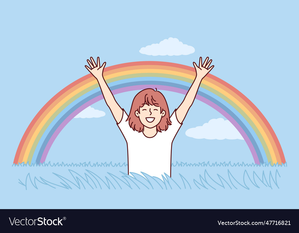 Happy girl rejoices at rainbow appeared in sky