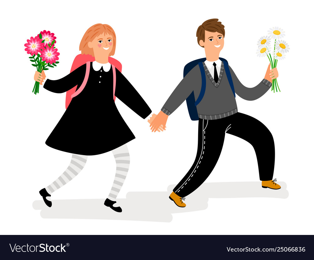 School children boy and girl with flowers