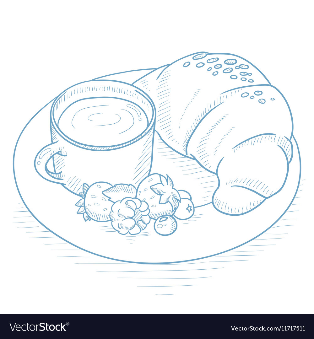 Breakfast with coffee croissant and berries