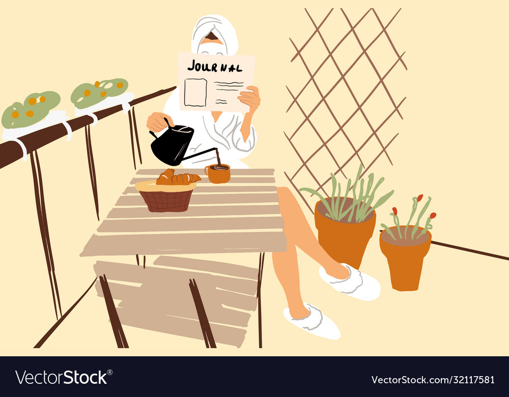 Woman having a breakfast on balcony