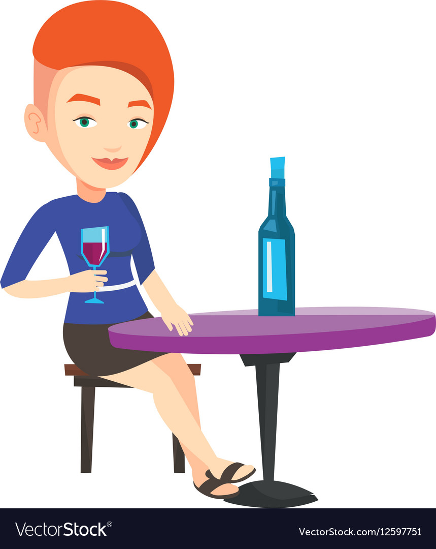 Woman drinking wine at restaurant