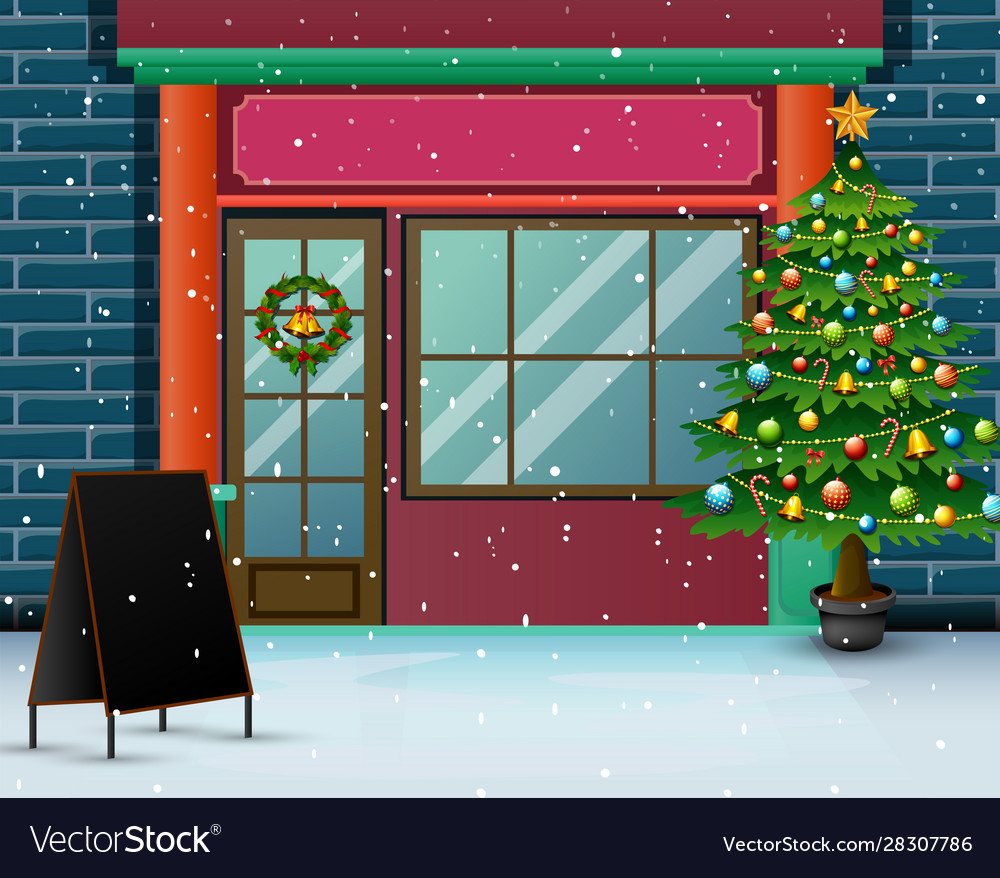 Christmas tree in front store with snowfall