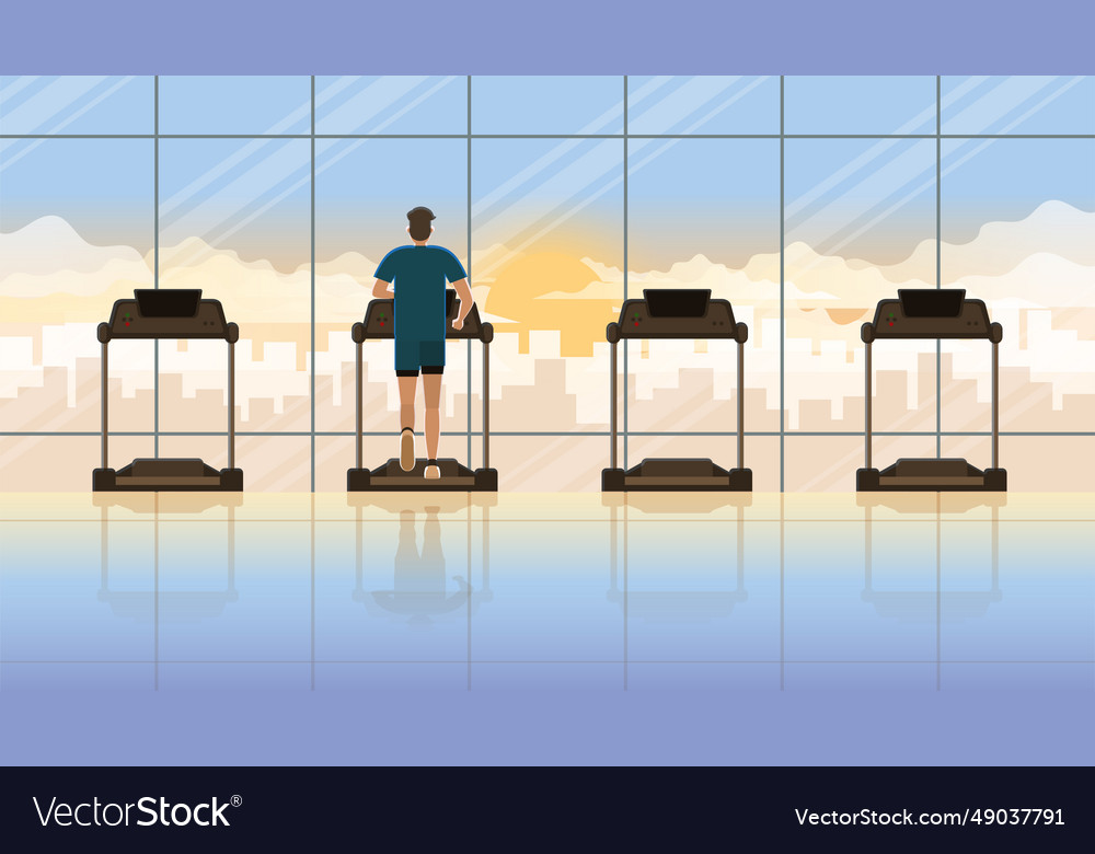Back view of alone man running on treadmill