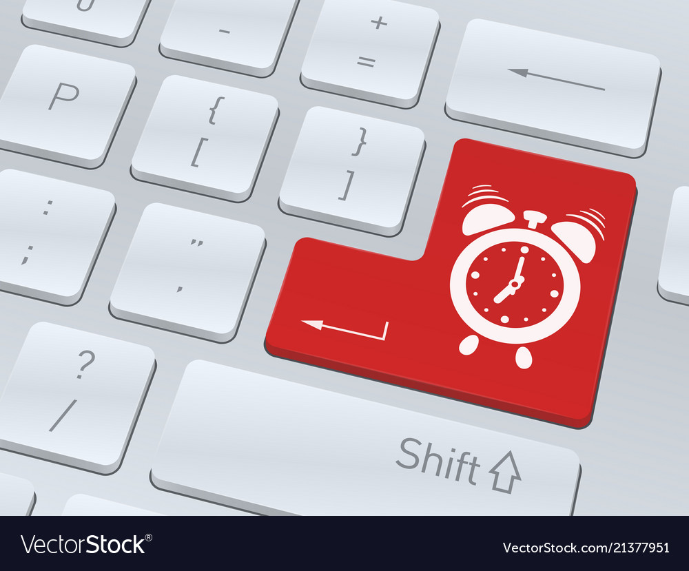 Alarm clock icon on white computer keyboard