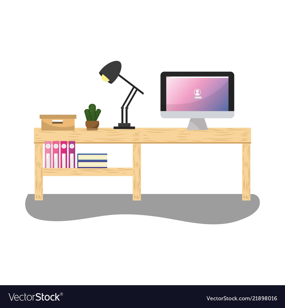 Office desk with computer and lamp books