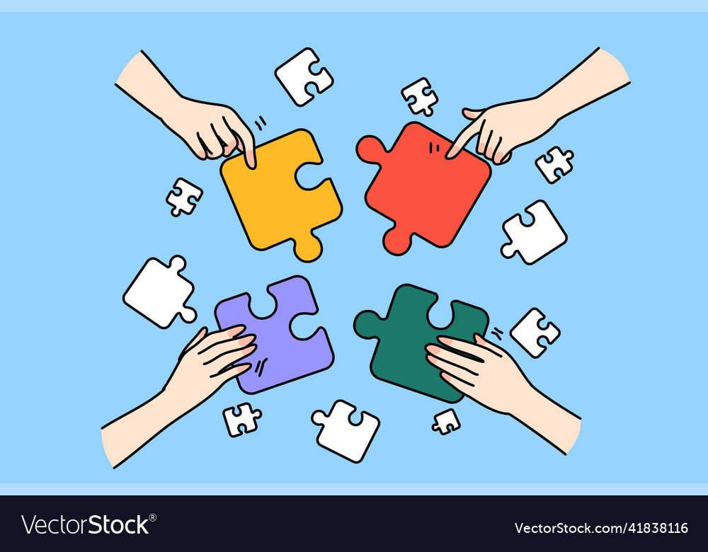 Diverse people connect jigsaw puzzles together