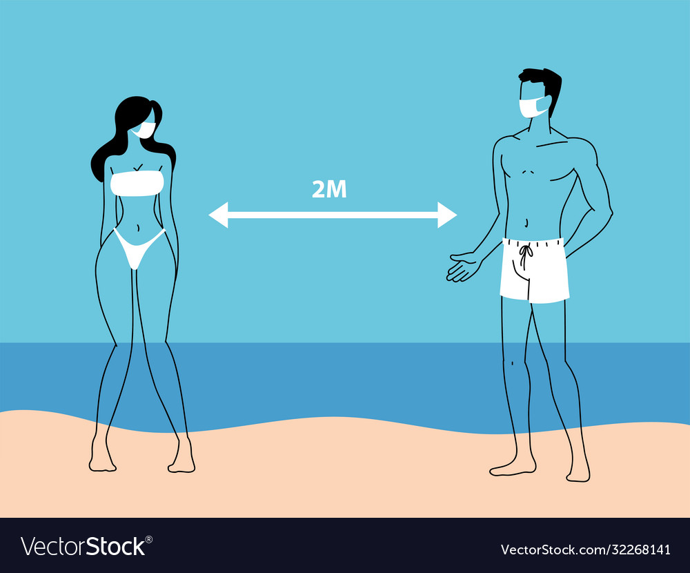 Couple people on beach keep social distance