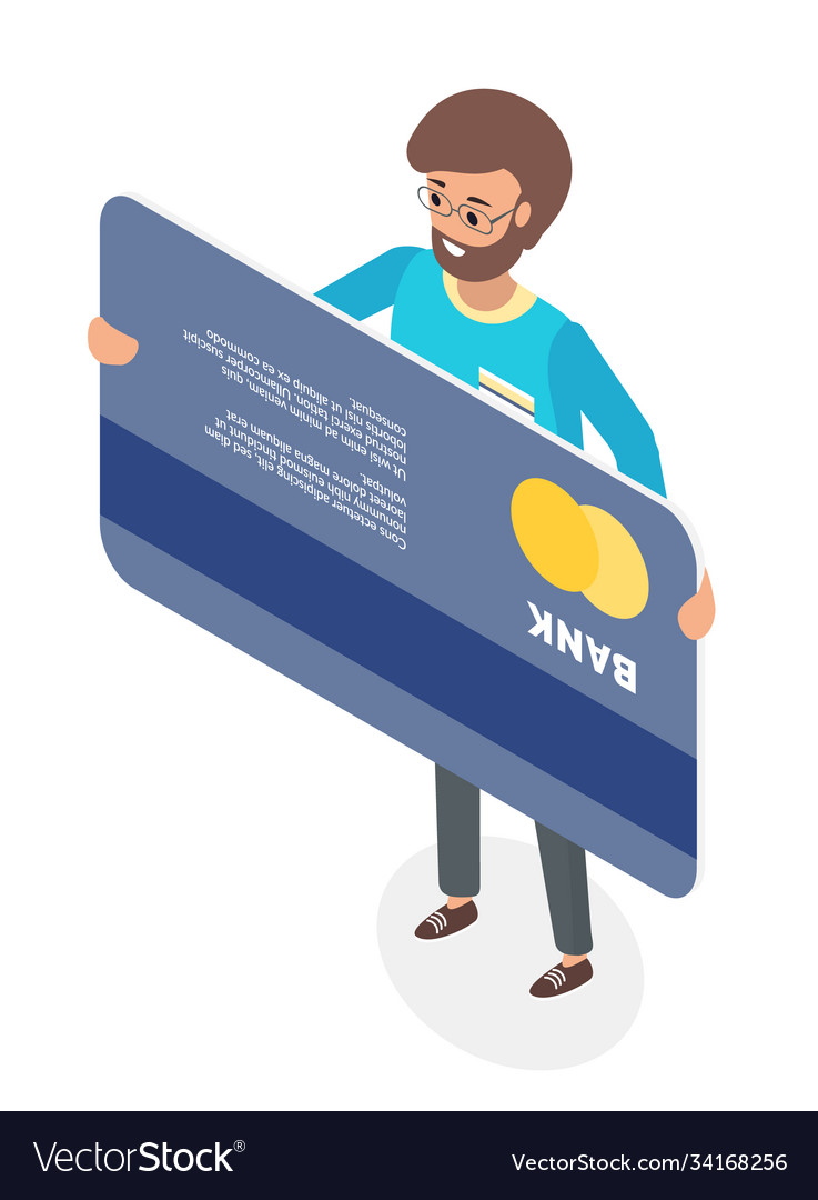 A happy man standing holding his credit card