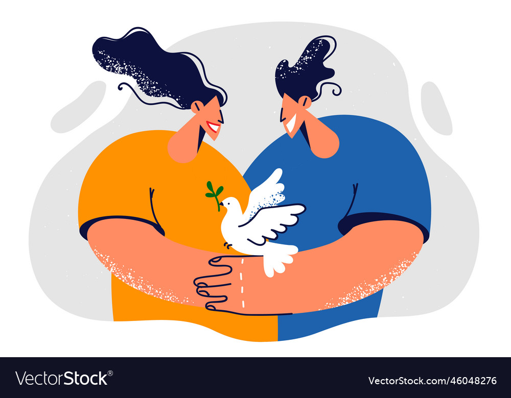 Man and woman with dove sitting on their hands