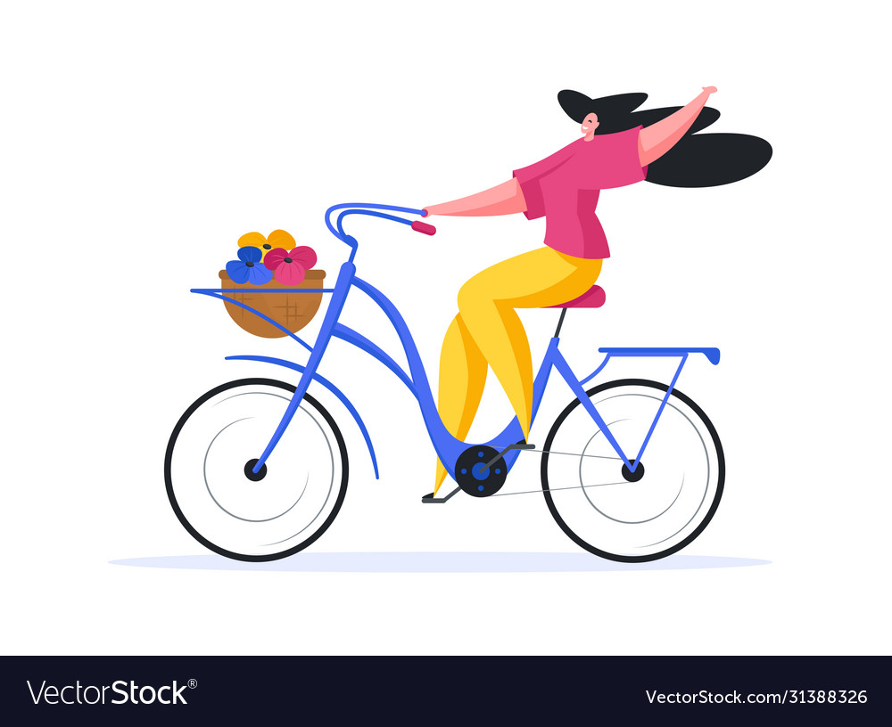 Happy woman riding bicycle with colorful flowers