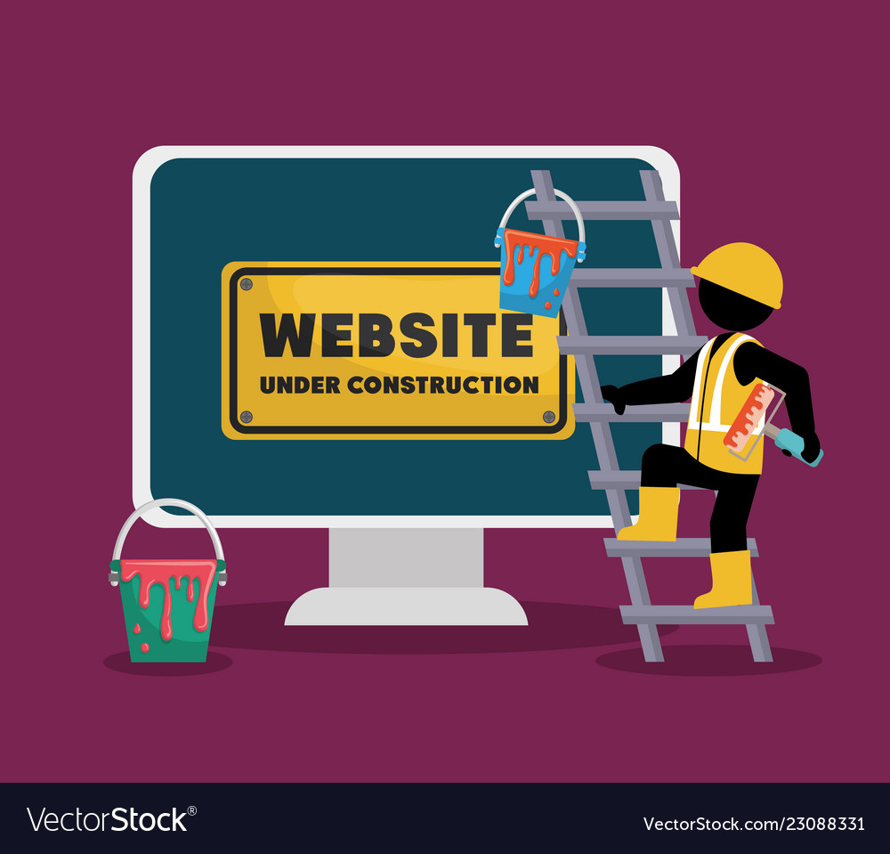 Website under construction with desktop computer