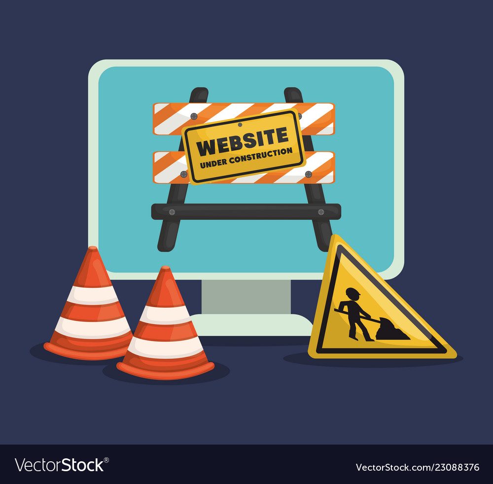 Website under construction with desktop computer
