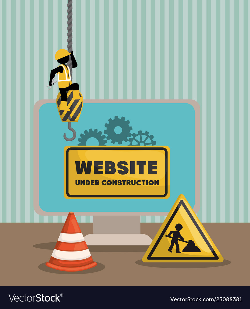 Website under construction with desktop computer
