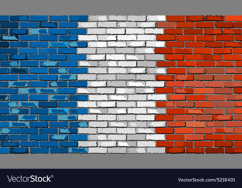 Grunge flag of france on a brick wall