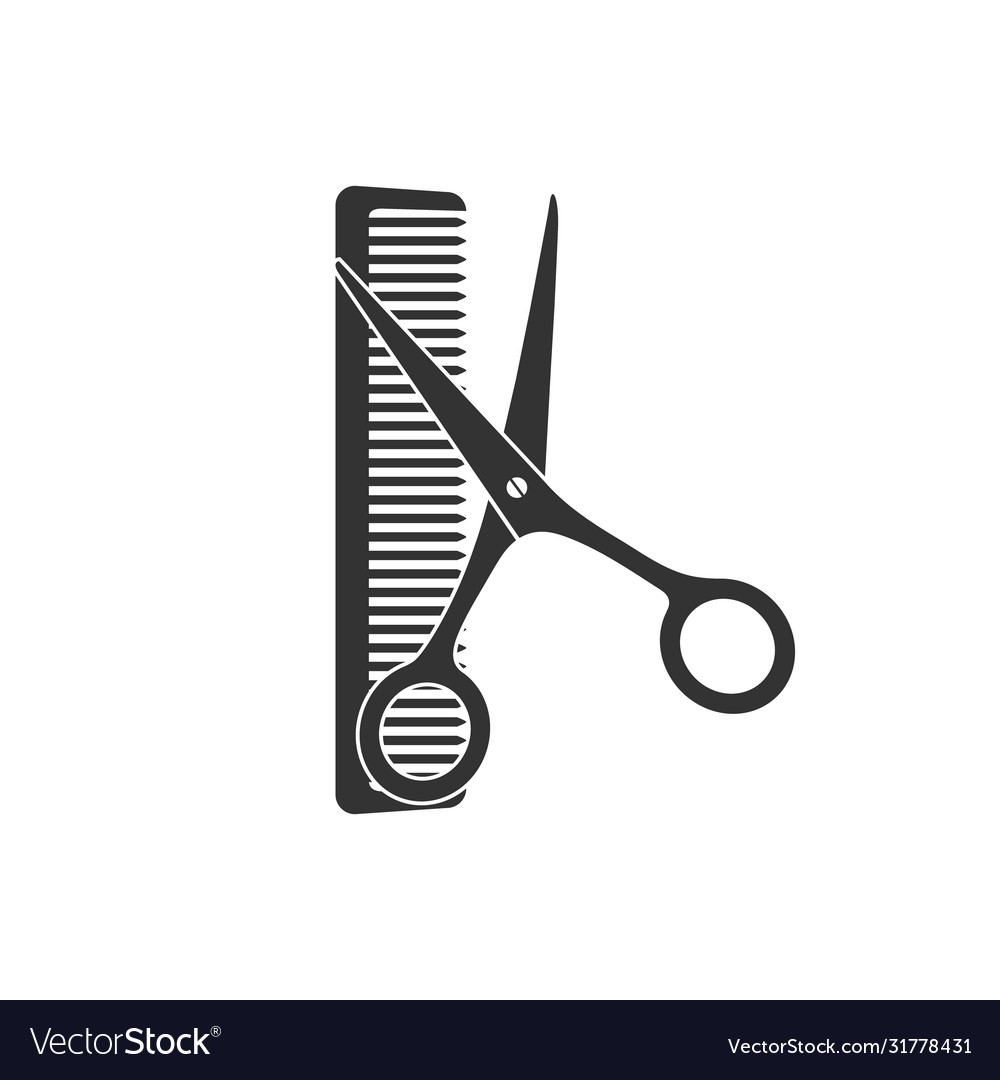 Scissors and comb isolated on white background