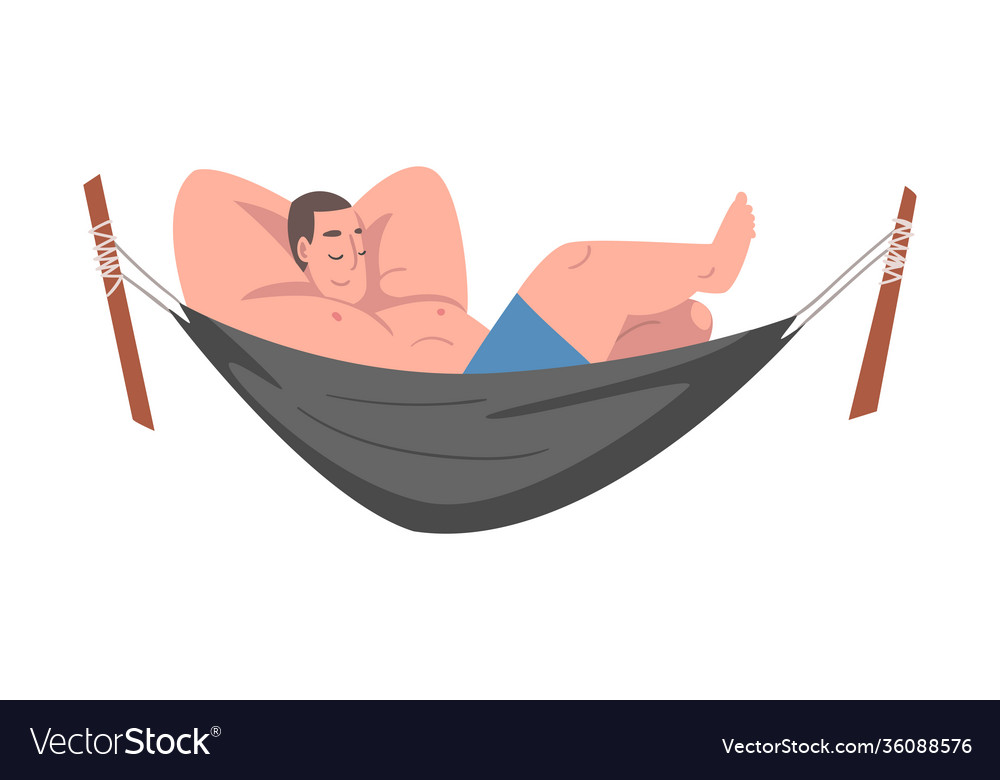 Smiling male lying in hammock and sleeping