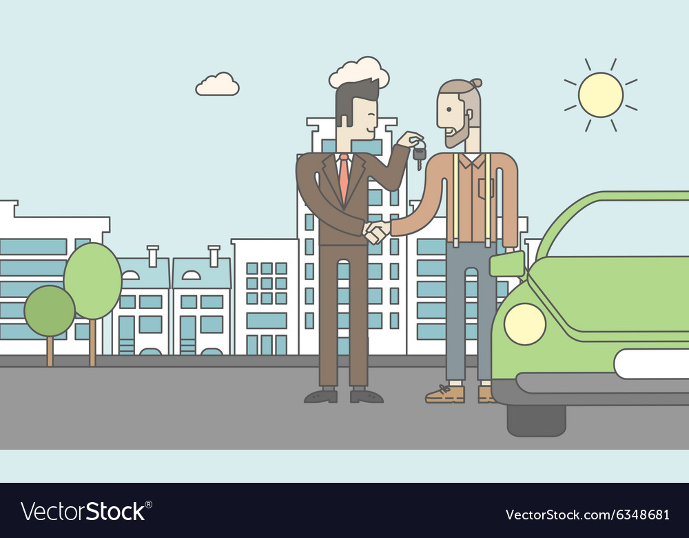 Car salesman giving the keys to a new owner