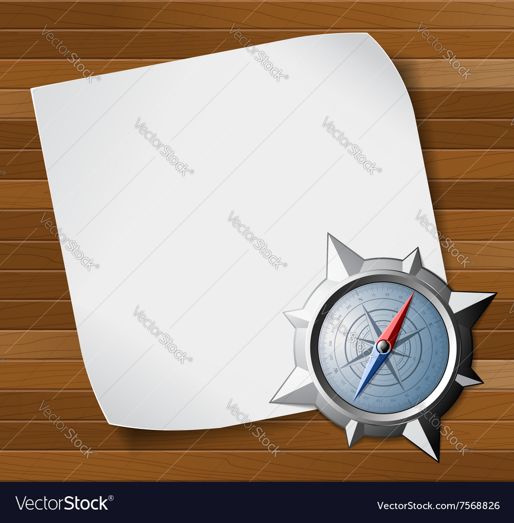 Compass and paper over wooden background