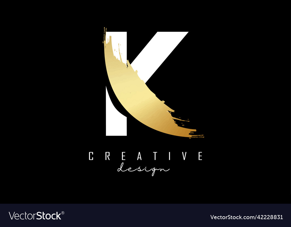 White letter k logo with golden brush stroke