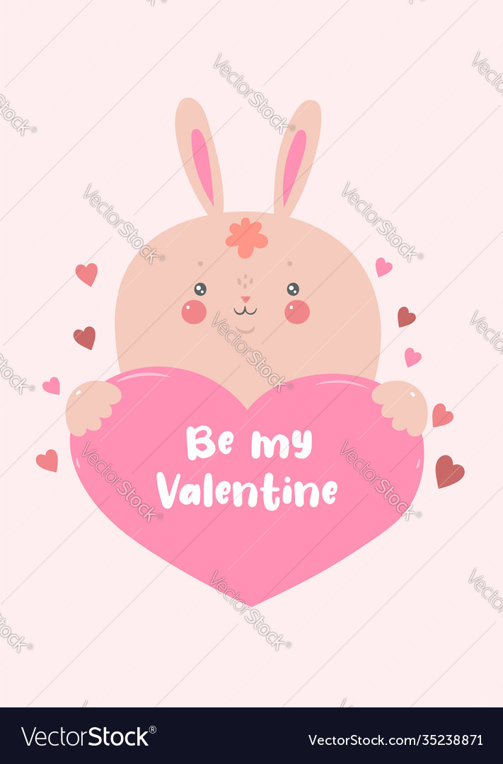 Rabbit holds heart valentine s day card