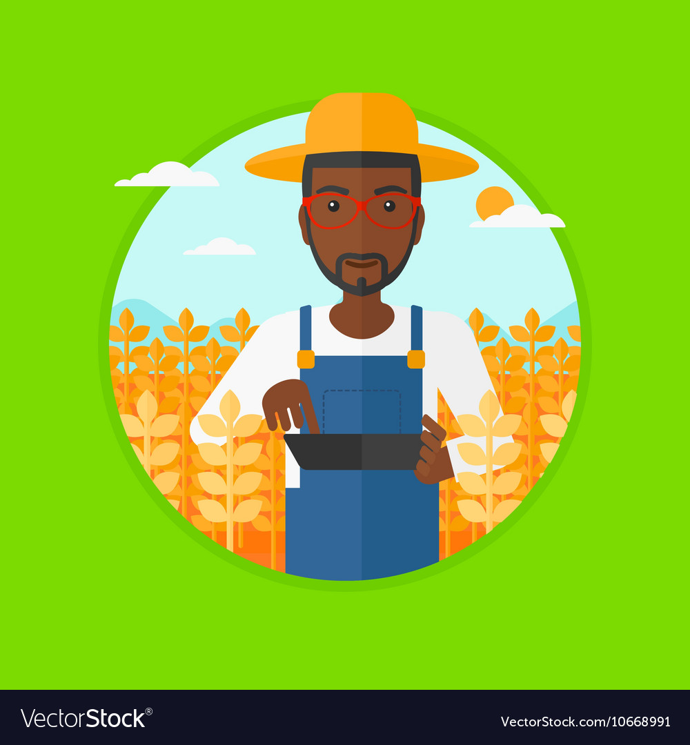 Farmer with tablet computer on field